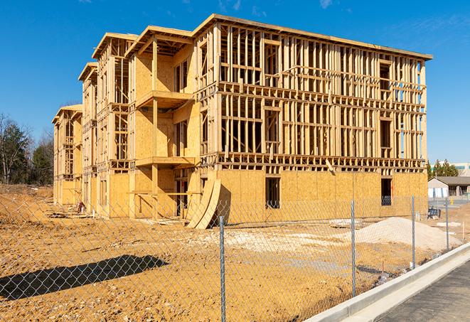 a snapshot of temporary chain link fences protecting a large construction project from unauthorized access in Hosford, FL